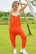 Women's sleeveless V-neck wide-leg jumpsuit with pockets, stylish and comfortable women's apparel by Trendsi.