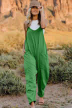 Women's sleeveless V-neck jumpsuit with pockets, lightweight casual romper by Plush Fashion Hub, full-length, comfortable summer outfit.