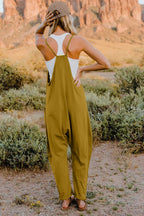 Women’s lightweight sleeveless V-neck jumpsuit with pockets, casual romper by Plush Fashion Hub, shown in full size.