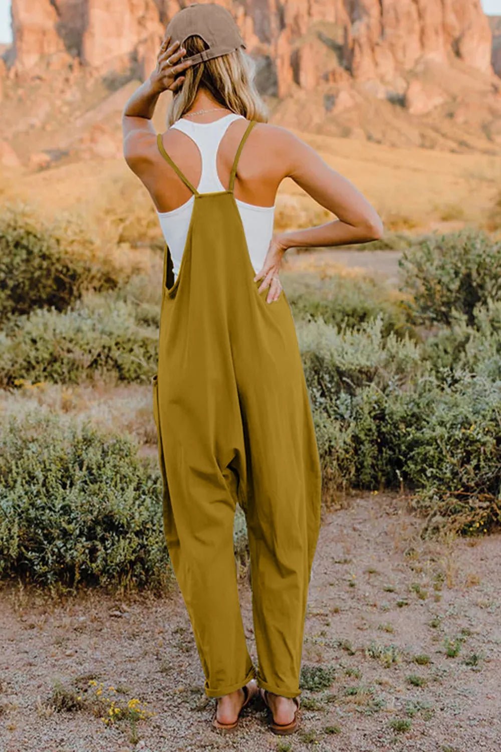 Women’s lightweight sleeveless V-neck jumpsuit with pockets, casual romper by Plush Fashion Hub, shown in full size.