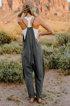 Women's sleeveless V-neck jumpsuit with pockets, lightweight and casual, by Plush Fashion Hub, perfect for warm weather.