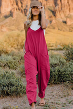 Women’s V-neck sleeveless jumpsuit with pockets, lightweight casual romper by Plush Fashion Hub, shown in full size.
