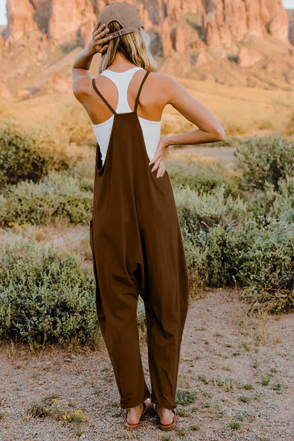 Women’s lightweight V-neck sleeveless jumpsuit with pockets, casual romper by Plush Fashion Hub, shown in full size.