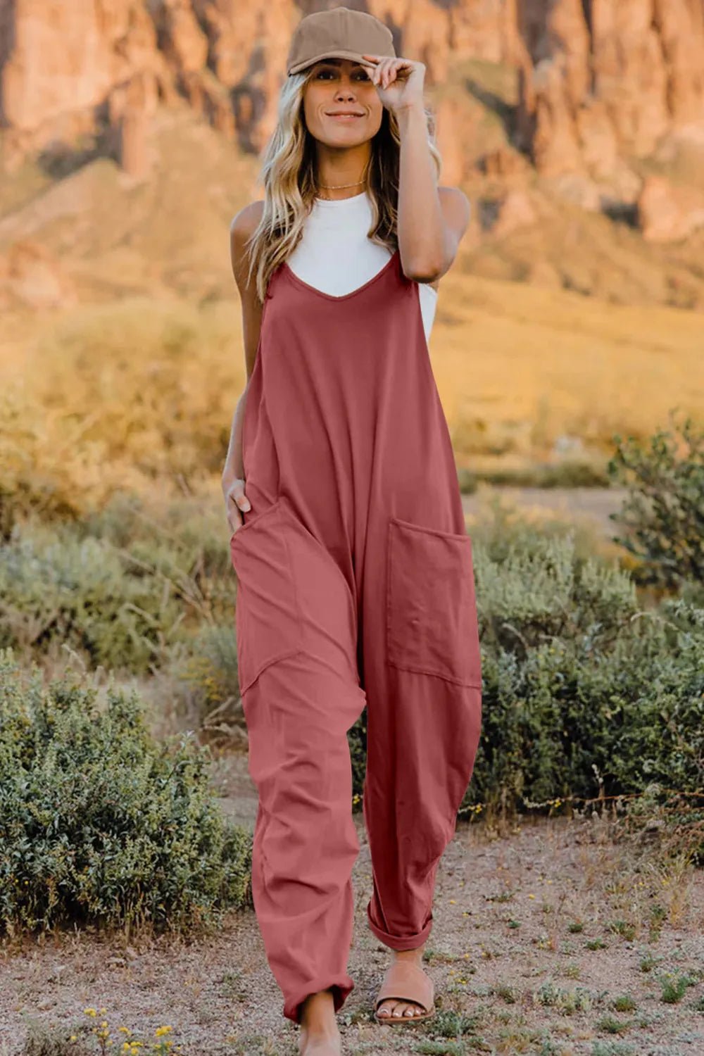 Women’s lightweight V-neck sleeveless jumpsuit with pockets, casual romper by Plush Fashion Hub, shown in full size.