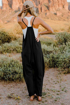Women's sleeveless V-neck jumpsuit with pockets, lightweight casual romper by Plush Fashion Hub, perfect for comfortable everyday wear.