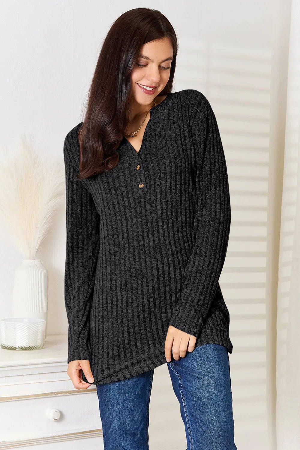Women's ribbed long sleeve notched neck t-shirt from Trendsi, slim fit casual top with a stylish notched neckline.