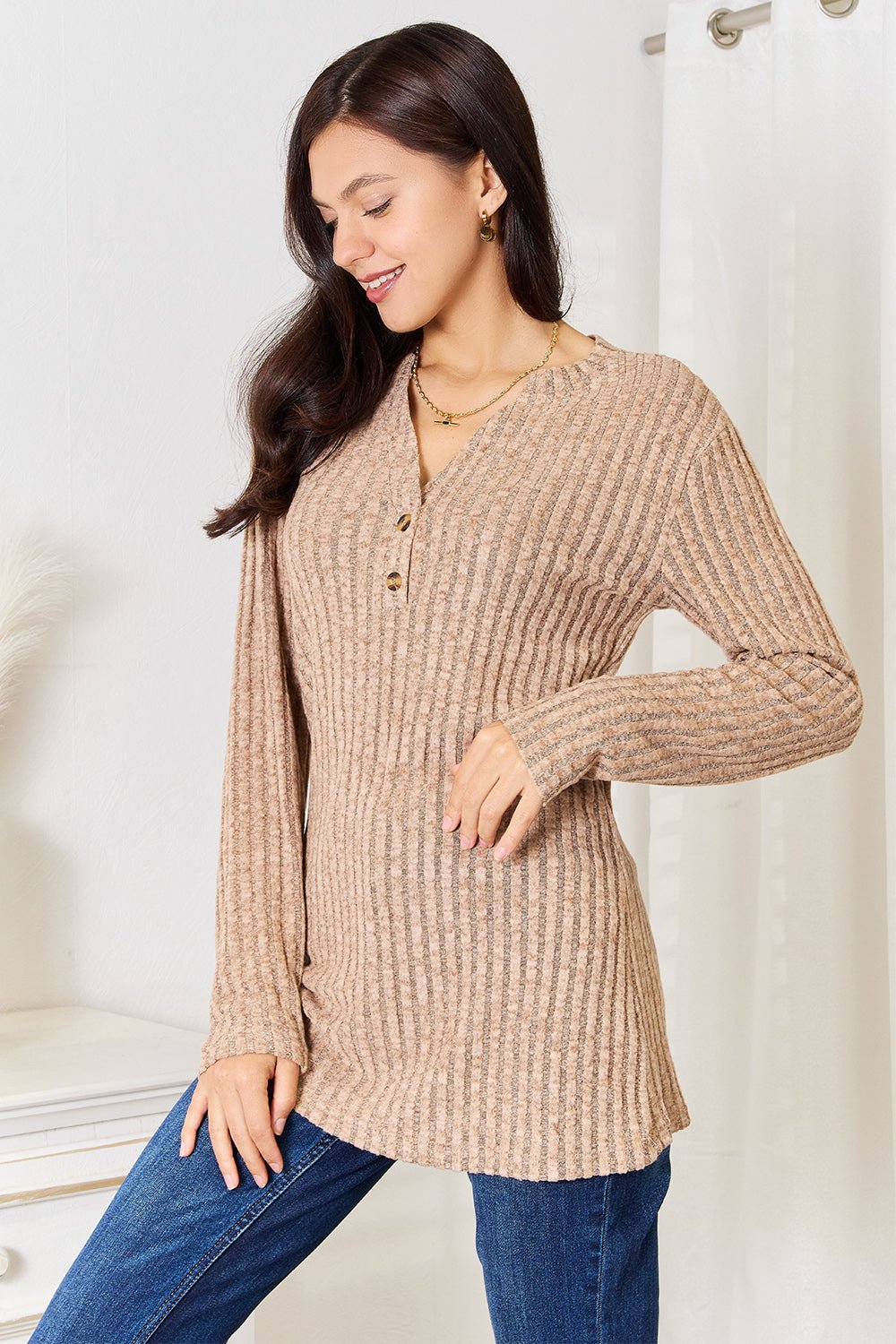 Women's ribbed long sleeve notched neck T-shirt by Trendsi, slim fit casual top with a stylish notched neckline and ribbed fabric.