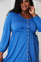 Women's long sleeve empire waist dress with scoop neckline and pockets, stylish midi dress by Trendsi.