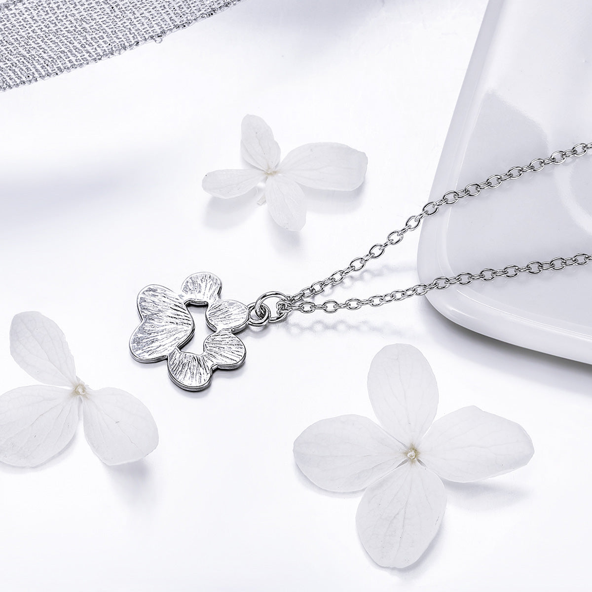 Sterling silver necklace with 1.5x1.4cm SCN pendant for women, featuring a delicate chain and polished silver finish.