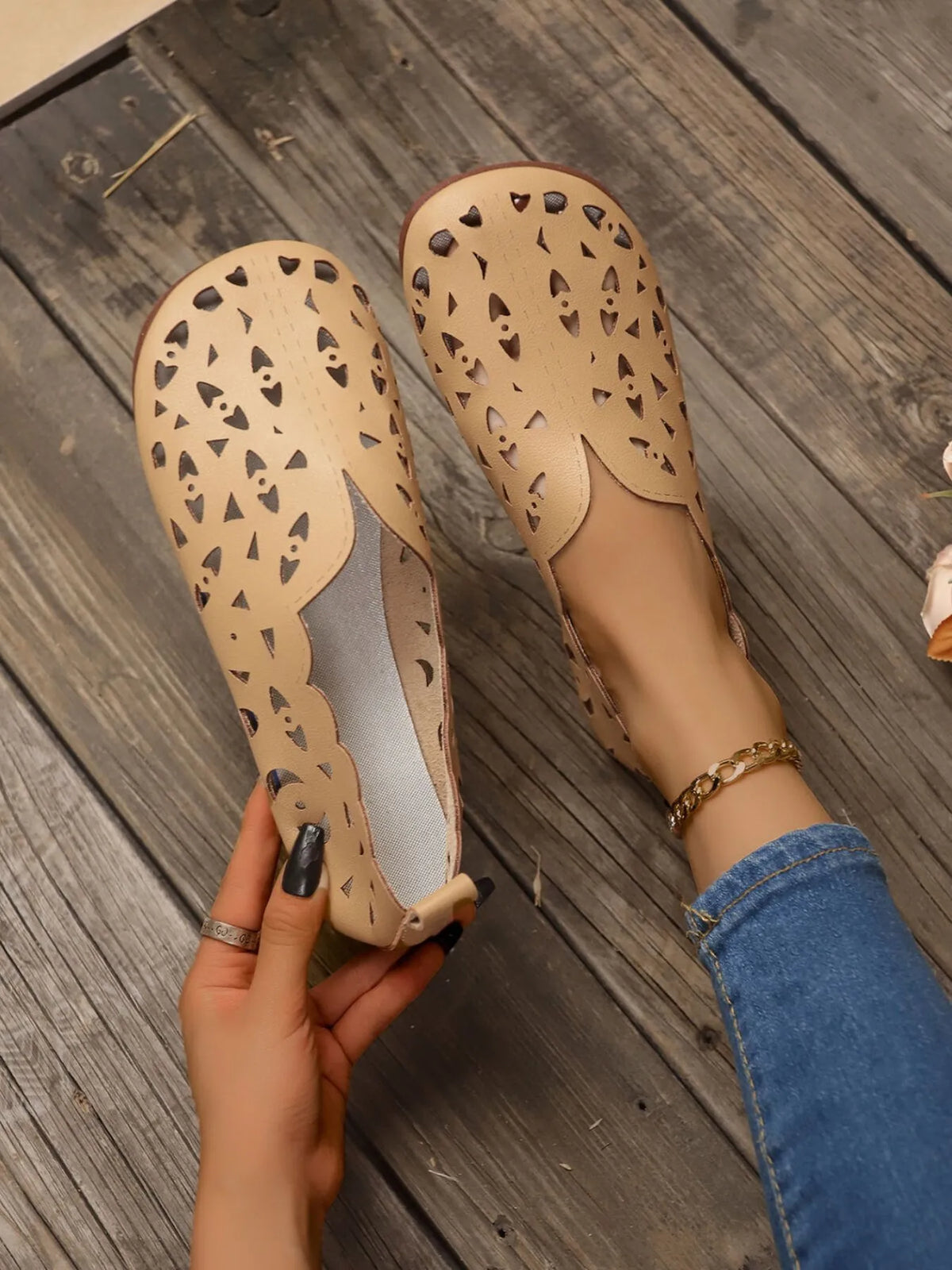 Perforated leather slip-on loafers from Trendsi, showcasing smooth leather upper with stylish perforations and comfortable sole.