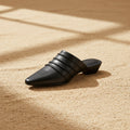 Handmade sheepskin ruched mule slides by FitiqueFit featuring a square toe and low heel, showcasing soft, plush footwear comfort.