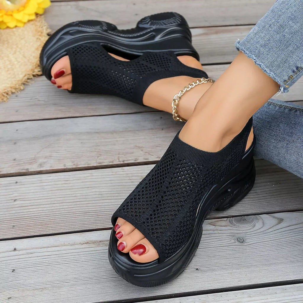 Open toe wedge sandals by Shopimist featuring a stylish design with a comfortable platform and ankle straps.