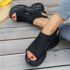 Open toe wedge sandals by Shopimist featuring a stylish design with a comfortable platform and ankle straps.