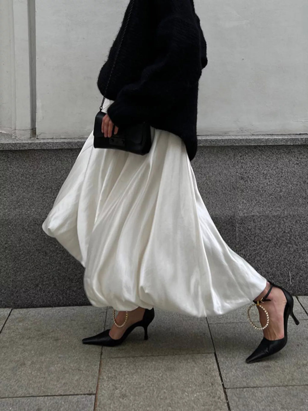 Flowy satin maxi skirt by Shopimist featuring a smooth, shiny fabric and a flowing silhouette, perfect for elegant, casual wear.