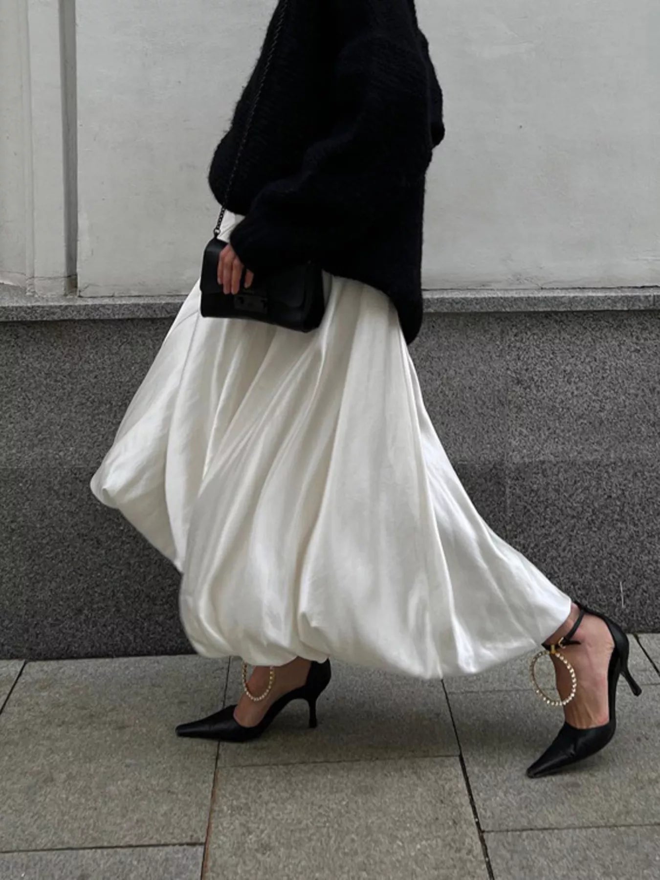 Flowy satin maxi skirt by Shopimist featuring a smooth, shiny fabric and a flowing silhouette, perfect for elegant, casual wear.