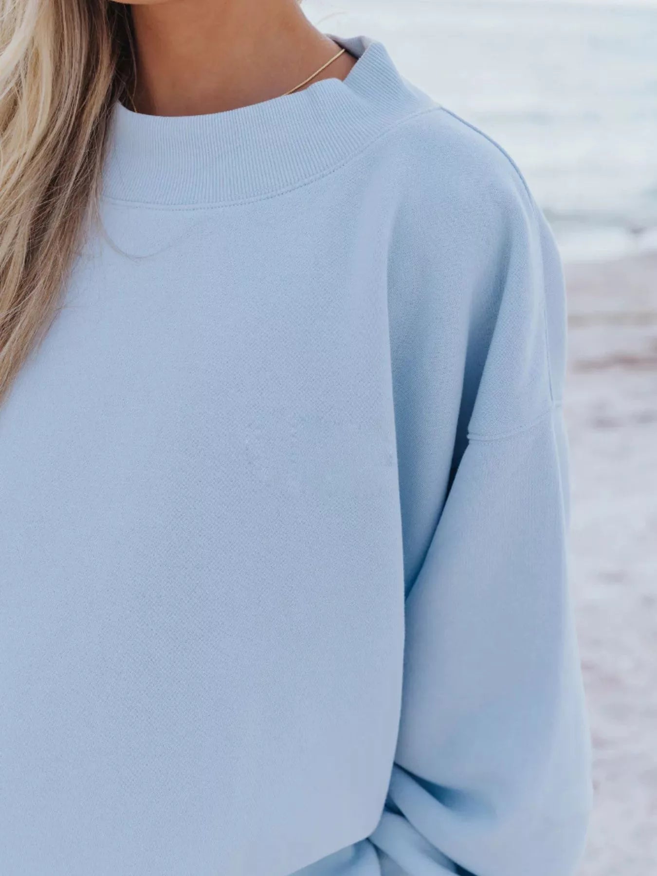Plush Fashion Hub relaxed fit round neck sweatshirt and shorts set, casual 2-piece loungewear in soft fabric, front view.