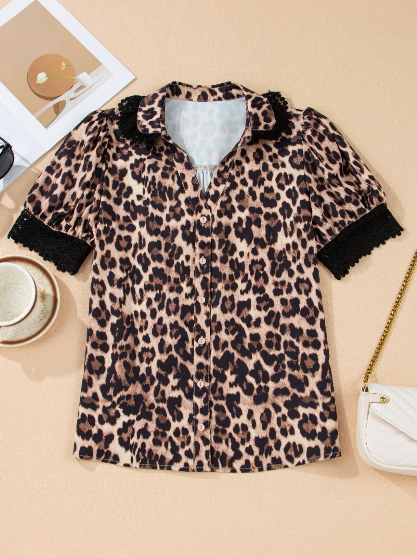 Leopard print short sleeve blouse with lace trim and button front, stylish top by Plush Fashion Hub.