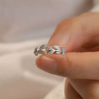925 sterling silver leaf ring with intricate leaf design, showcasing craftsmanship and elegant jewelry style.