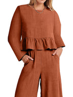 Women's ruffled hem long sleeve top and pants lounge set with pockets, casual 2-piece set by Trendsi, relaxed and stylish.