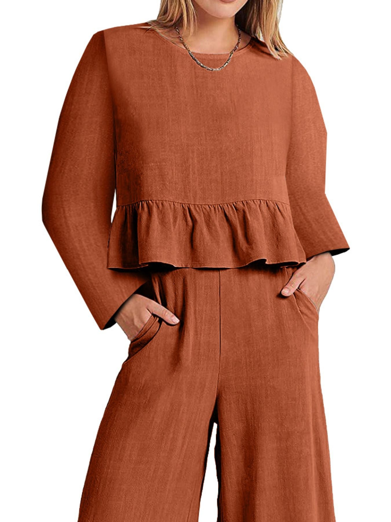 Women's ruffled hem long sleeve top and pants lounge set with pockets, casual 2-piece set by Trendsi, relaxed and stylish.