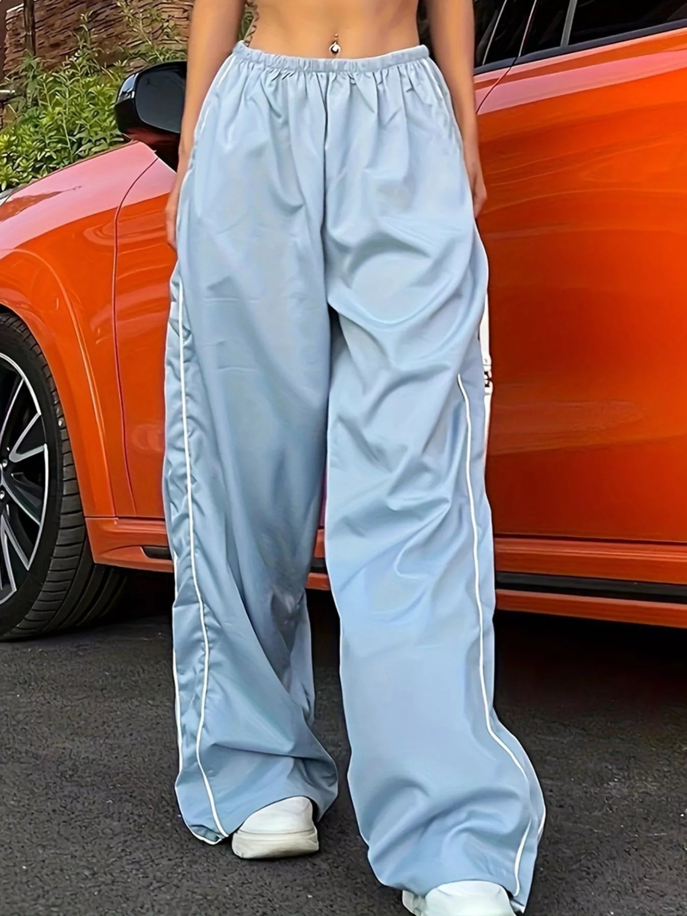 Women's high-rise wide-leg lightweight dress trousers with elastic waist, stylish and comfortable from Trendsi.