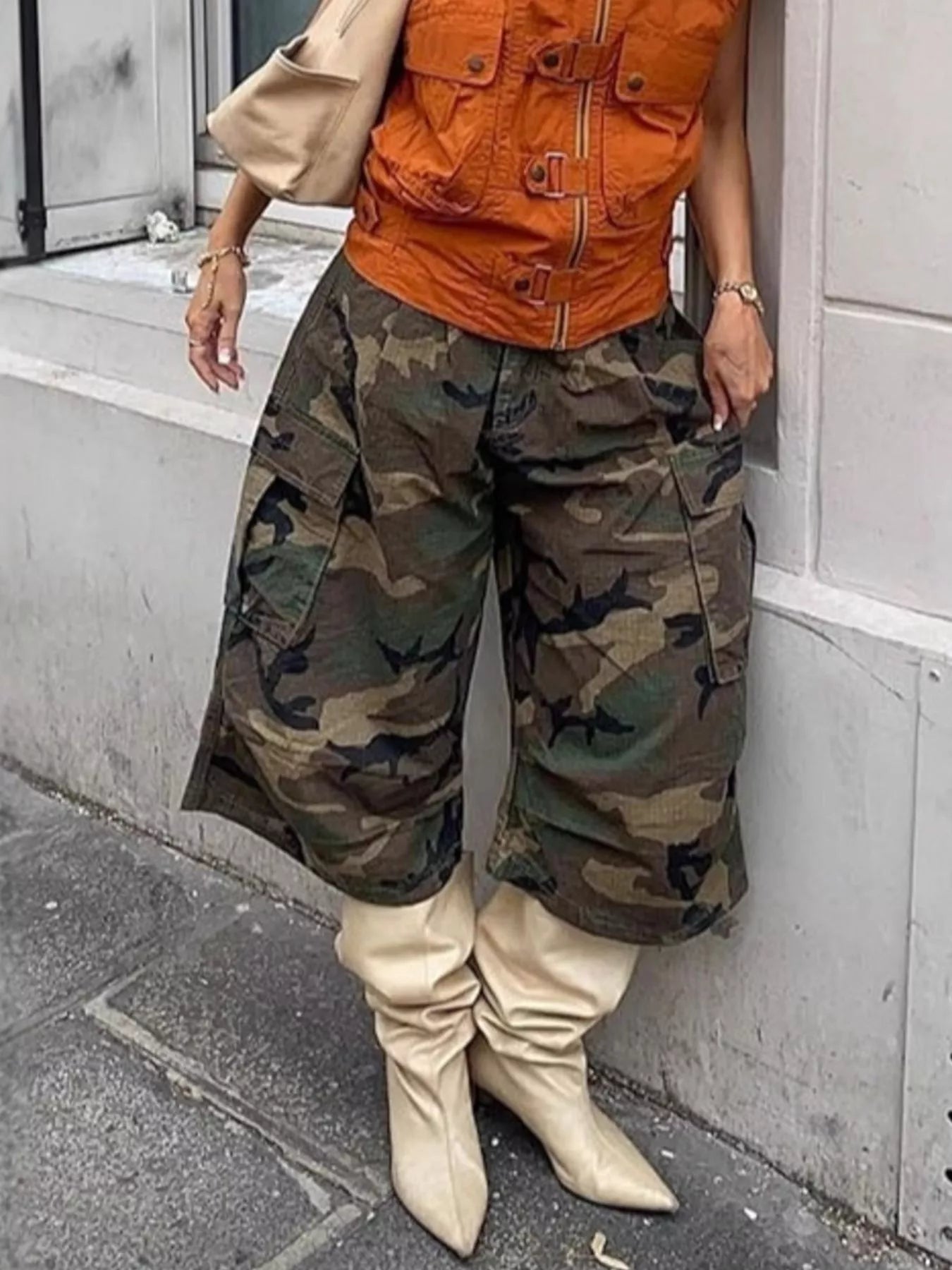 Camouflage cargo cropped pants by Plush Fashion Hub featuring multiple pockets and a relaxed fit, perfect for casual wear.