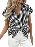 Women's gingham print button-down shirt with tie detail by Trendsi, featuring classic pattern and stylish design.