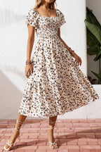 Women's square neck ruffle sleeve smocked midi dress in cotton blend, featuring a stylish and comfortable design by Plush Fashion Hub.