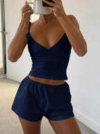 V-neck cami and shorts activewear set by Trendsi, featuring lightweight fabric, comfortable fit, ideal for workouts or casual wear.
