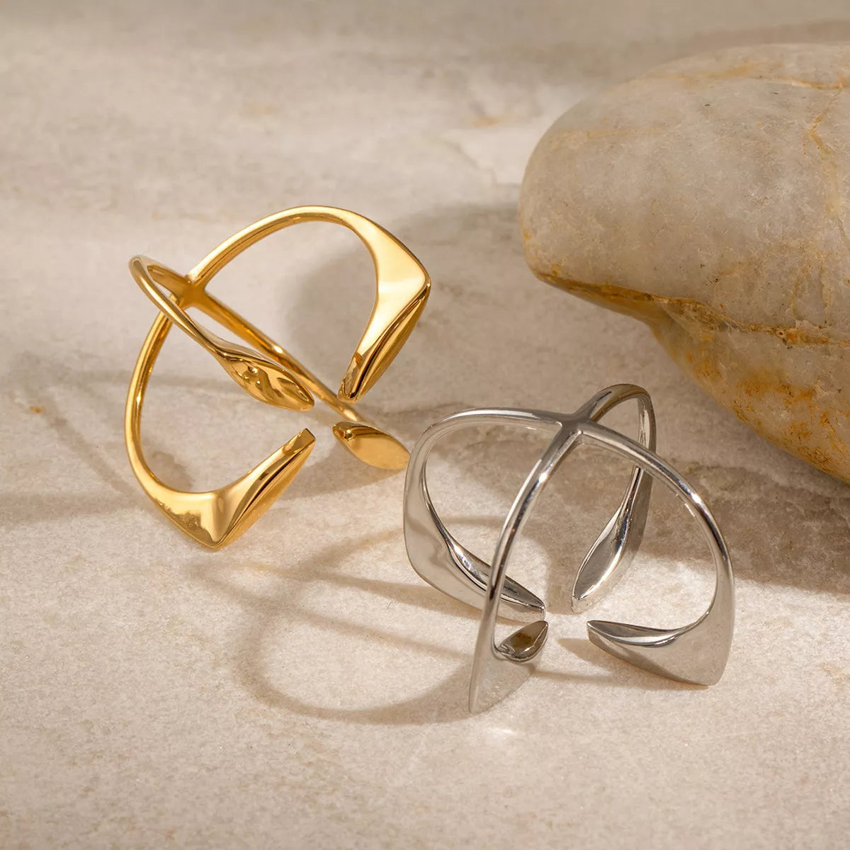 Stainless steel crisscross open ring with sleek design, featuring a contemporary style for fashionable accessories.