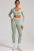 Fitglutes Activewear long sleeve crop top and matching leggings 2-piece set, stylish gymwear for workout and active lifestyle.