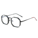 Lightweight metal frame sunglasses with sleek, stylish design by Plush Fashion Hub, featuring dark tinted lenses and modern shape.