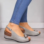 Women's comfortable peep toe wedge sandals with mid-heel, casual dress shoes featuring a stylish design and neutral color.