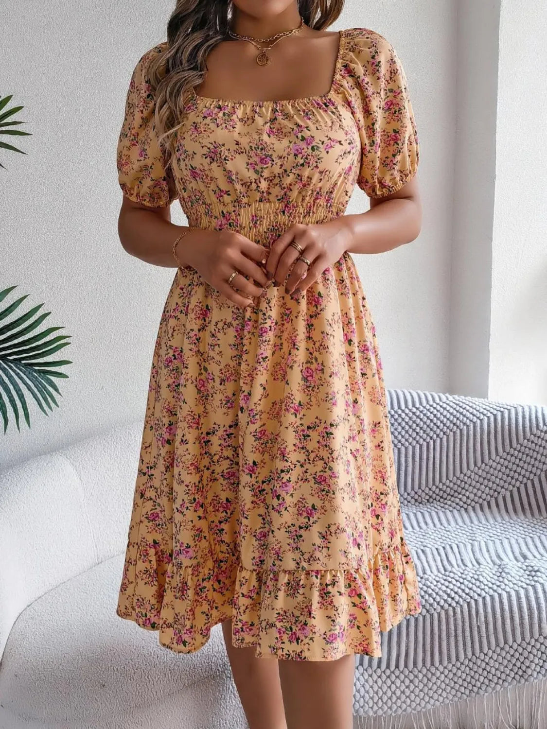 Floral puff sleeve dress with ruffled hem by Shopimist, featuring a feminine design and lightweight fabric perfect for spring and summer.