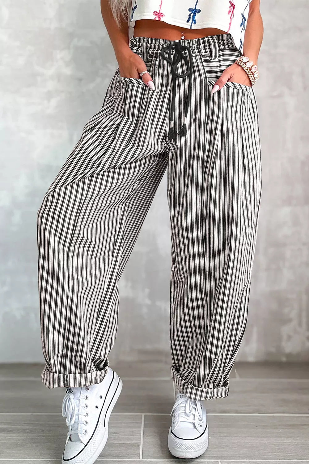 Light gray stripe drawstring casual loose pants by Trendsi, featuring a comfortable fit and relaxed style, shown on a model.