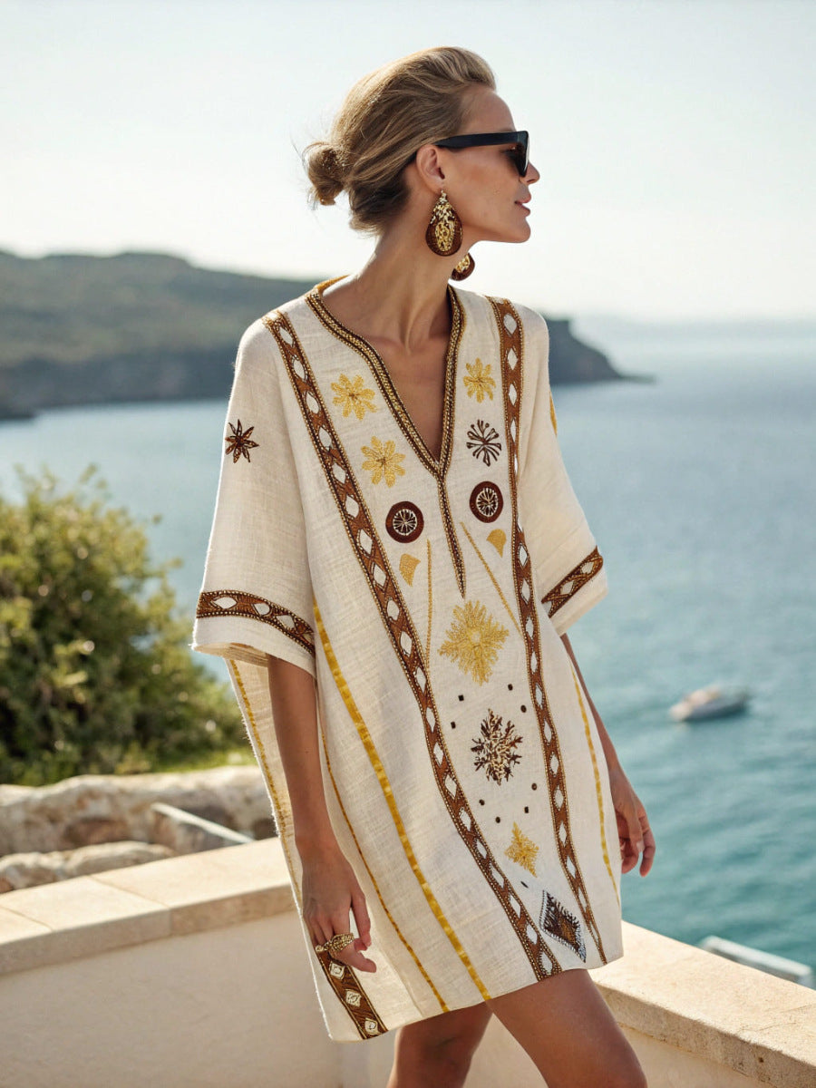 Women's printed loose A-line beach midi dress by FitiqueFit, featuring a flowy design and vibrant vacation resort-inspired pattern.