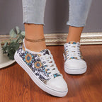 Women's low top floral canvas shoes with breathable design by Trendy Attic Store01, showcasing colorful flower patterns and casual style.