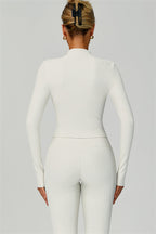 Fitglutes activewear 3-piece set including a sports bra, jacket, and leggings designed for workout and gym activities.
