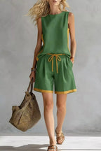 Contrast trim sleeveless tank and shorts loungewear set from Trendsi, featuring casual fit and comfortable fabric for relaxed wear.