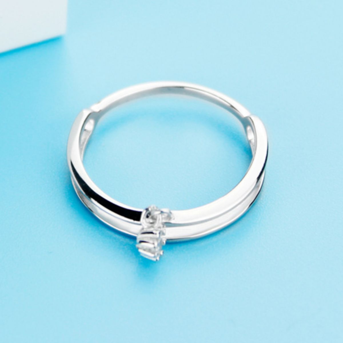 Double layered 925 sterling silver ring with intricate design, showcasing a stylish and elegant jewelry piece from Plush Fashion Hub.