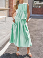 Women's striped sleeveless top and midi skirt two-piece set by Trendsi, featuring a stylish matching striped design.