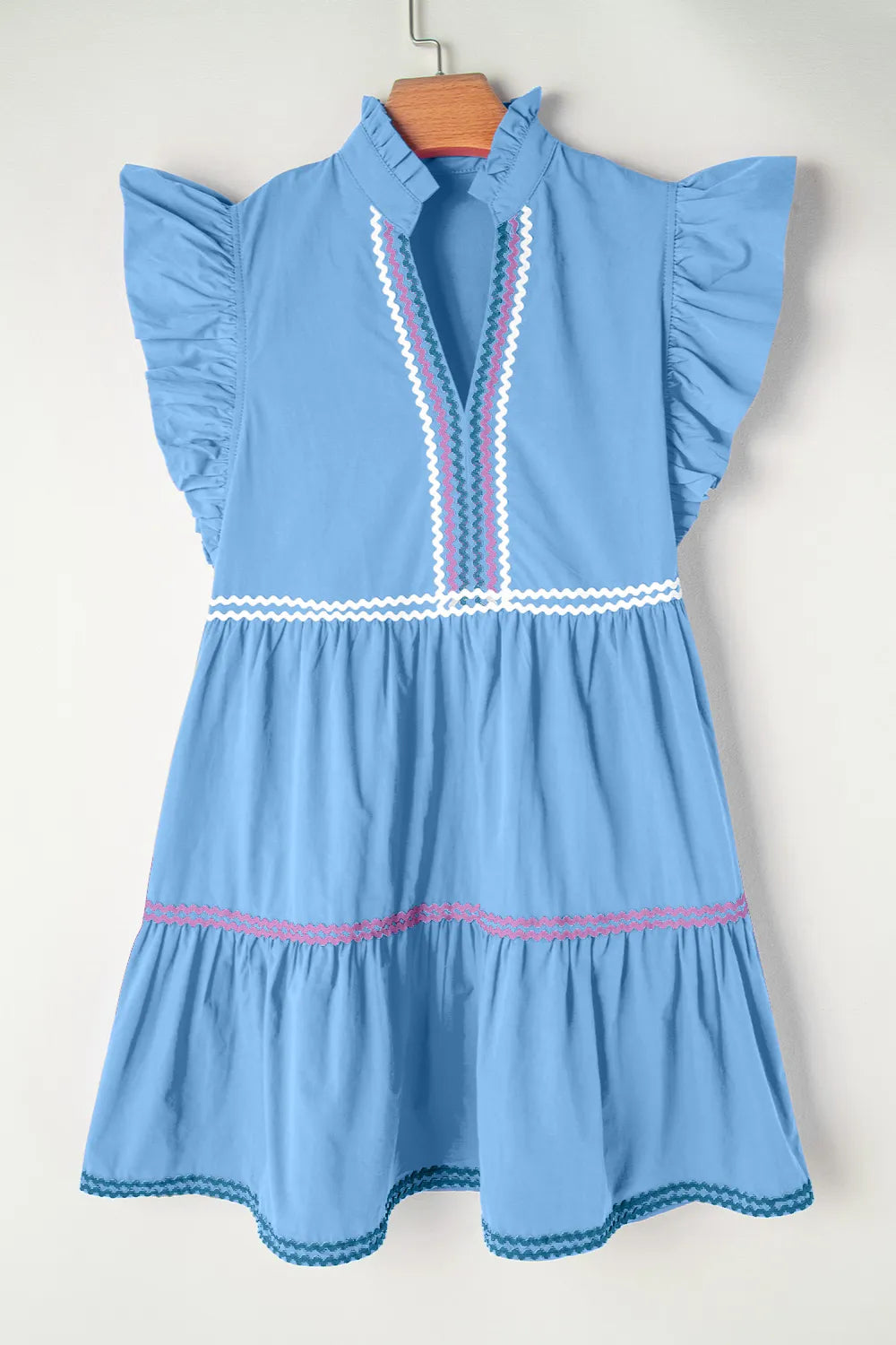 Cotton ruffled notched cap sleeve mini dress by Trendsi featuring a stylish, feminine design with ruffle details and a mini length.