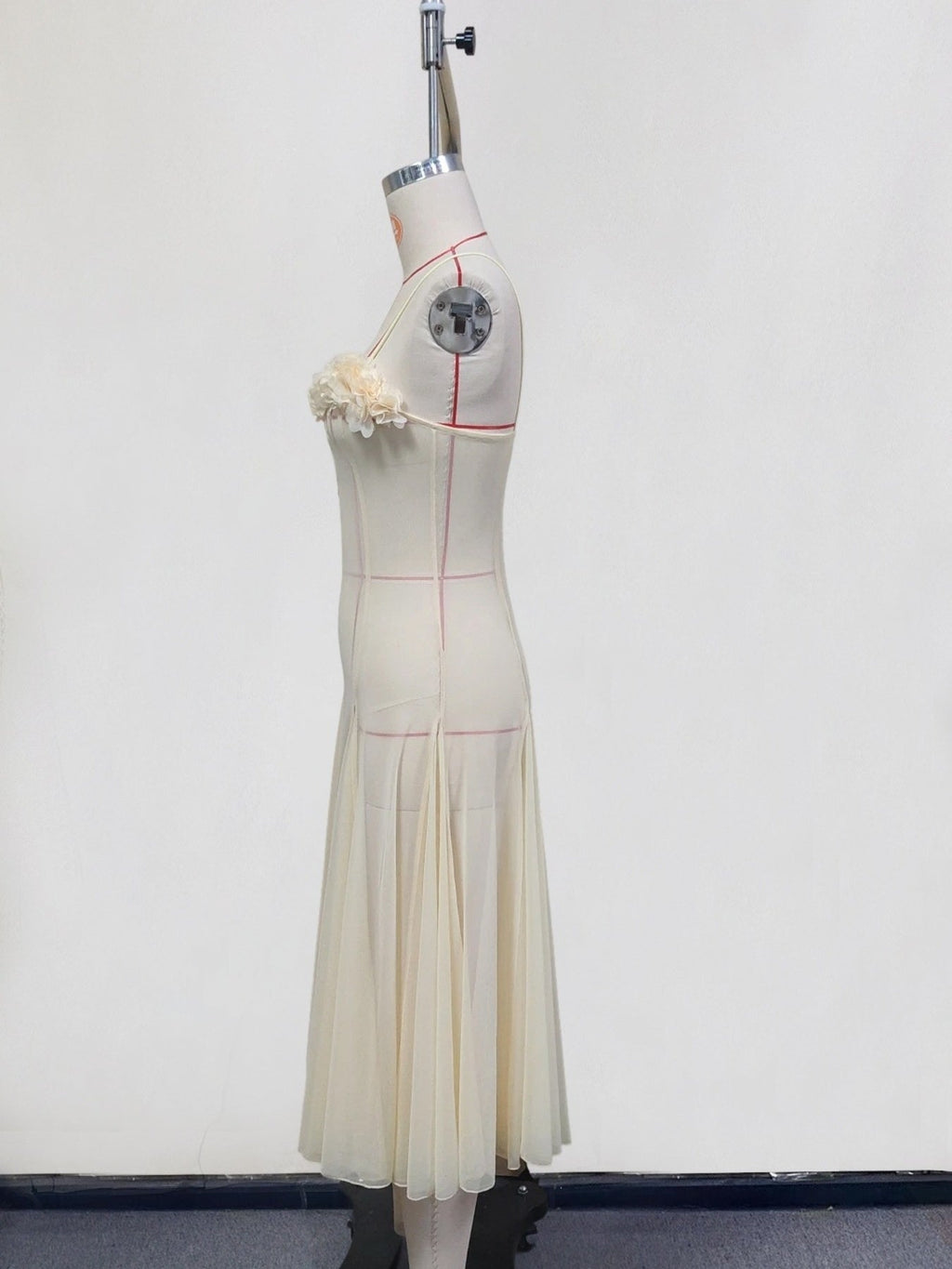 Floral embellished spaghetti strap dress by Shopimist, featuring delicate floral details and lightweight fabric for a stylish summer look.