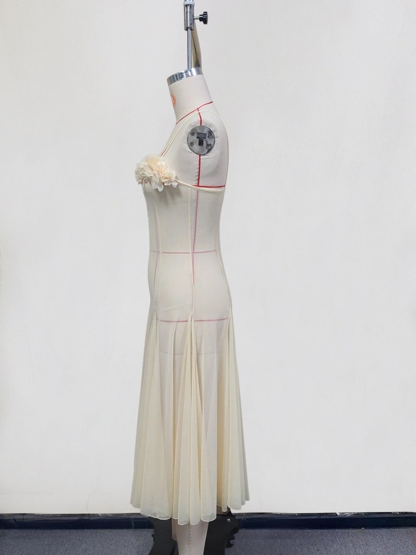Floral embellished spaghetti strap dress by Shopimist, featuring delicate floral details and lightweight fabric for a stylish summer look.
