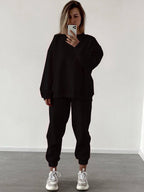 Women’s loose fit crewneck sweatshirt and jogger pants two-piece set by Plush Fashion Hub, casual matching loungewear ensemble.
