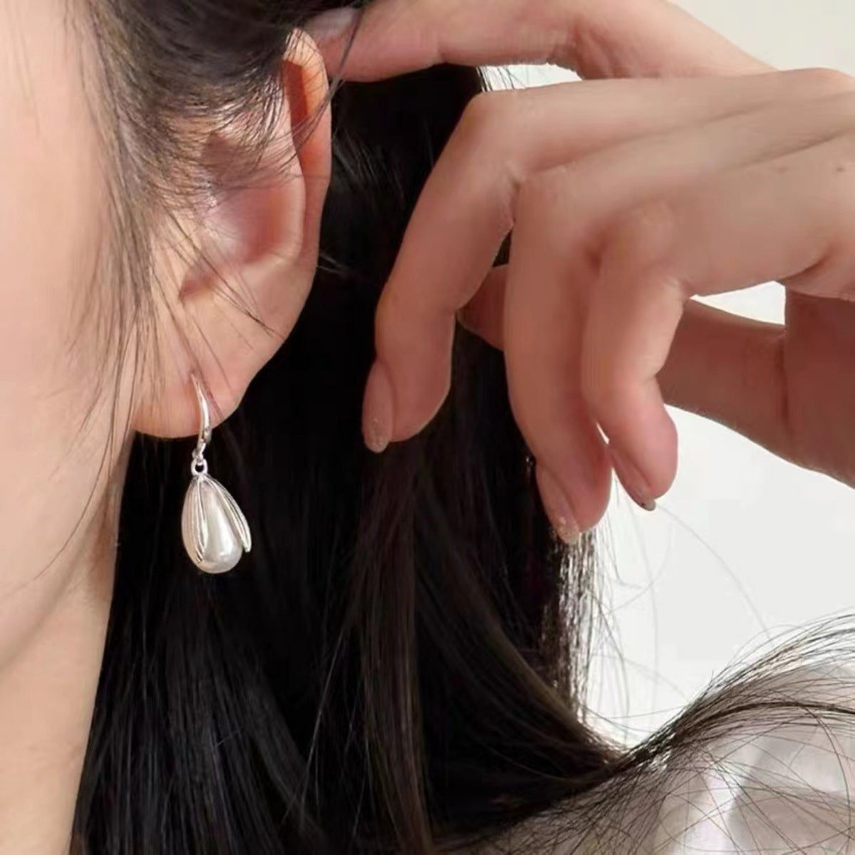 Sterling silver drop earrings from Plush Fashion Hub featuring elegant, dangling design with polished finish.