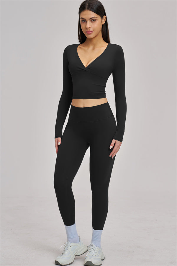 Fitglutes Activewear long sleeve crop top with fitted design, ideal for gym and workout sessions.