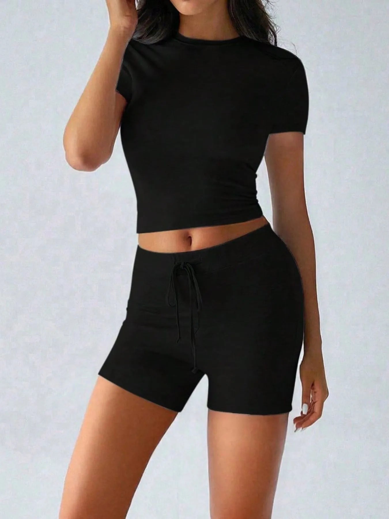 Trendsi active wear set featuring a round neck short sleeve top and matching shorts, casual athletic outfit for women.