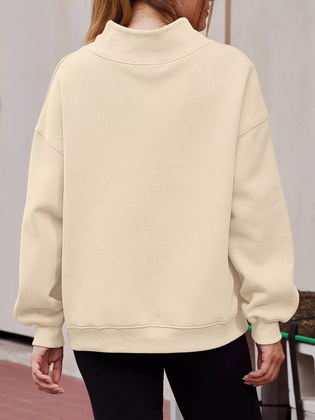 Women's oversized mock neck dropped shoulder pullover sweatshirt from Trendsi, casual and cozy top with relaxed fit.