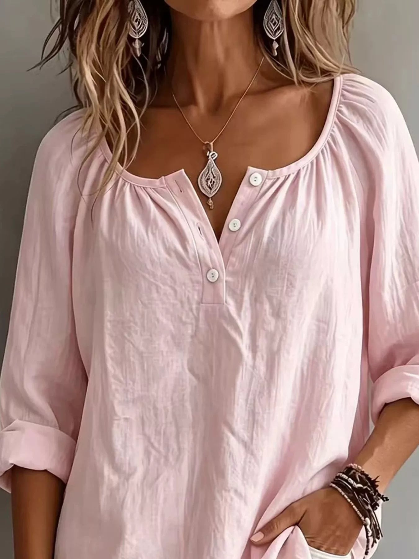 Plush Fashion Hub long sleeve top with button details, soft fabric, and relaxed fit, ideal for casual or stylish wear.